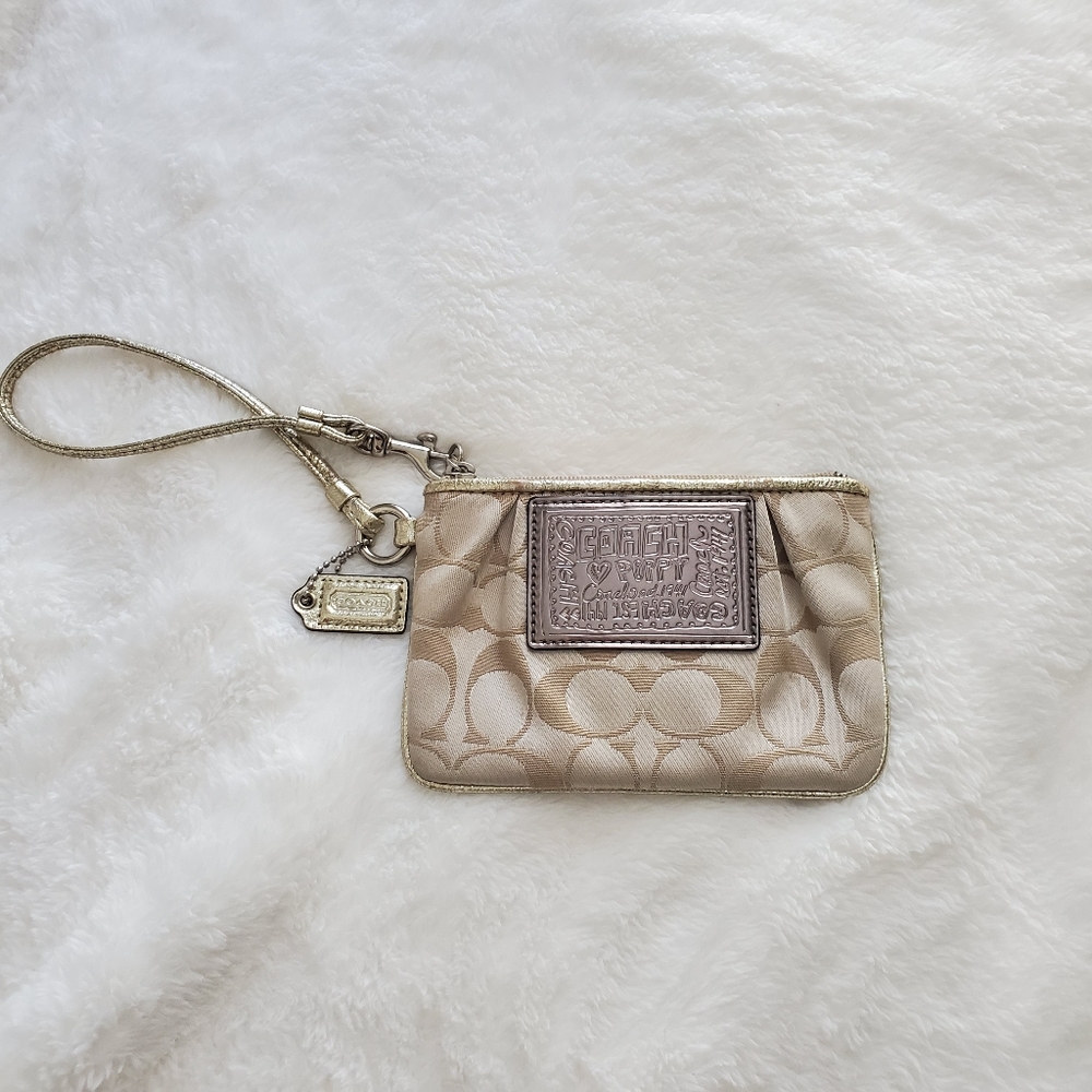 Coach POPPY collection wristlet.  Beige/gold
